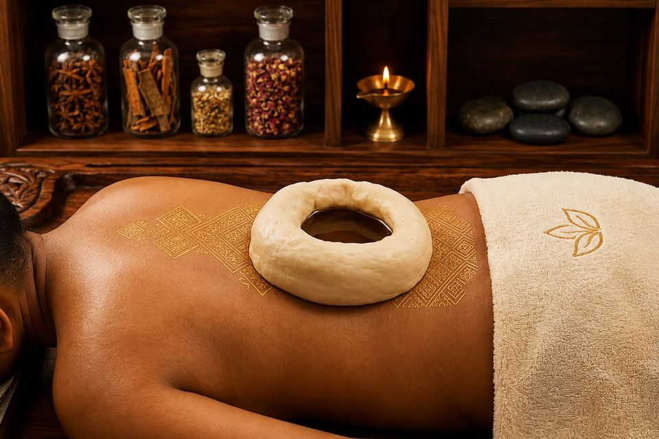 Dough ring holding warm medicated oil on the lower back during Kadi Vasthi